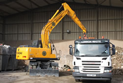 Skip Hire Essex unloading a lorry for transfer